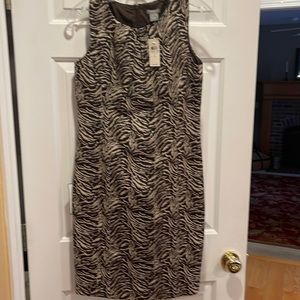 Brand new Ann Taylor brown printed dress. Size 2.  Fully lined.  Zipper back